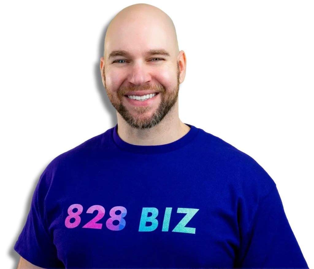 Andrew Murkens smiling and wearing a purple 828 Biz t-shirt