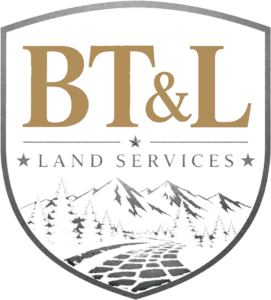 Bill's Tree and Landscaping Logo inside of a shield with mountains and a stone path at the bottom