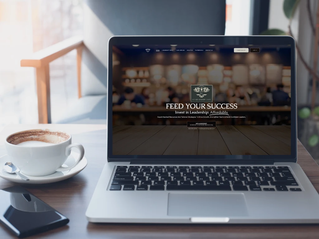 Custom website design for The Leadership Cafe displayed on a laptop by 828 Biz Marketing